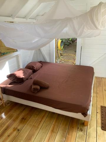 Postel nebo postele na pokoji v ubytování Akunamatata Guest House Cul de Sac