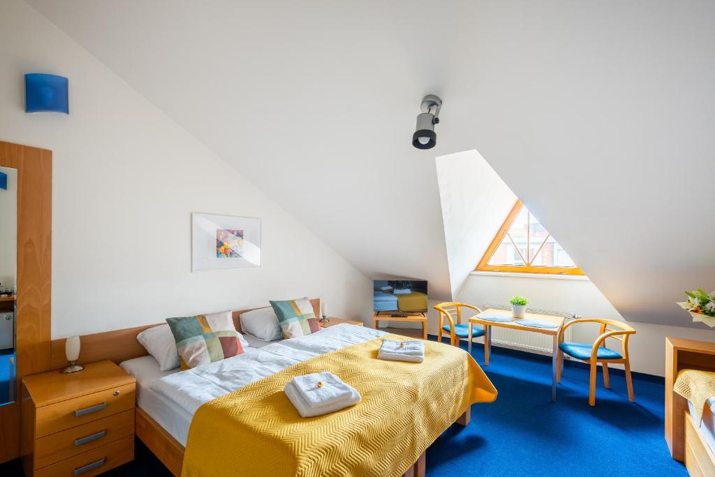 Postel nebo postele na pokoji v ubytování Libero Residence