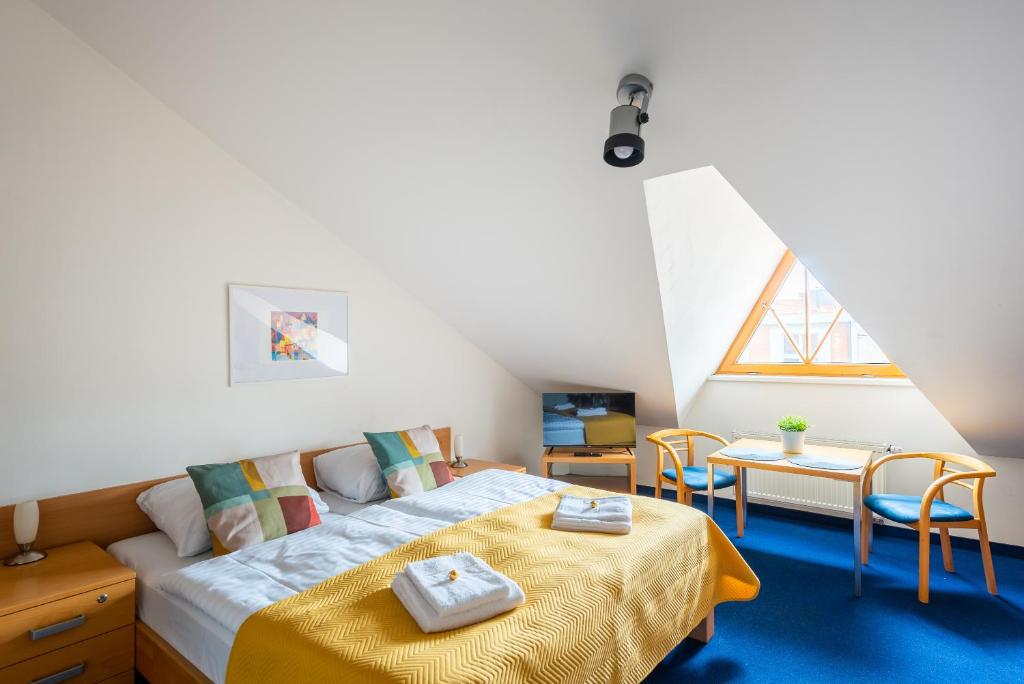 Postel nebo postele na pokoji v ubytování Libero Residence