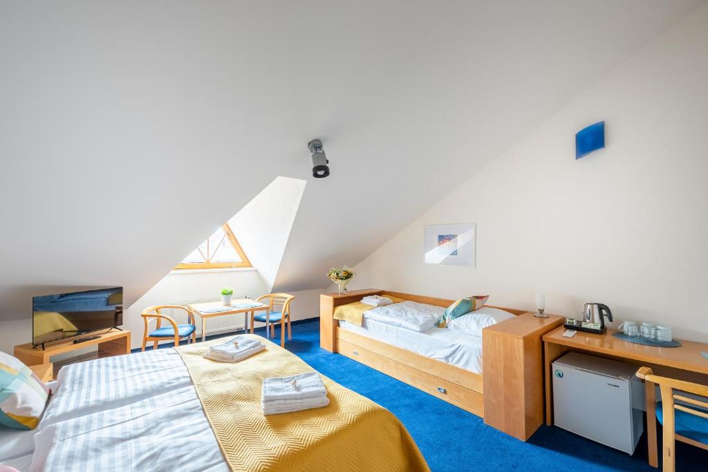 Postel nebo postele na pokoji v ubytování Libero Residence