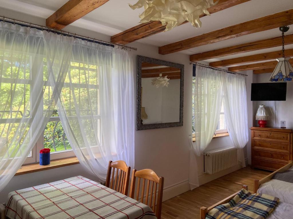 Posteľ alebo postele v izbe v ubytovaní Villa Parkowa 5