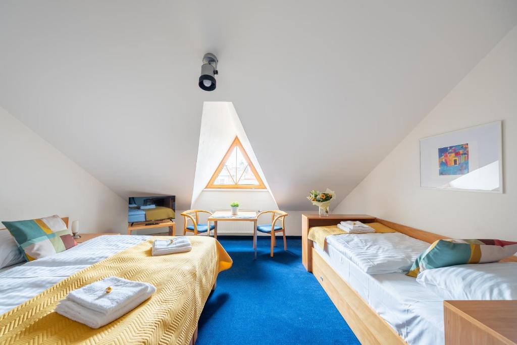 Postel nebo postele na pokoji v ubytování Libero Residence