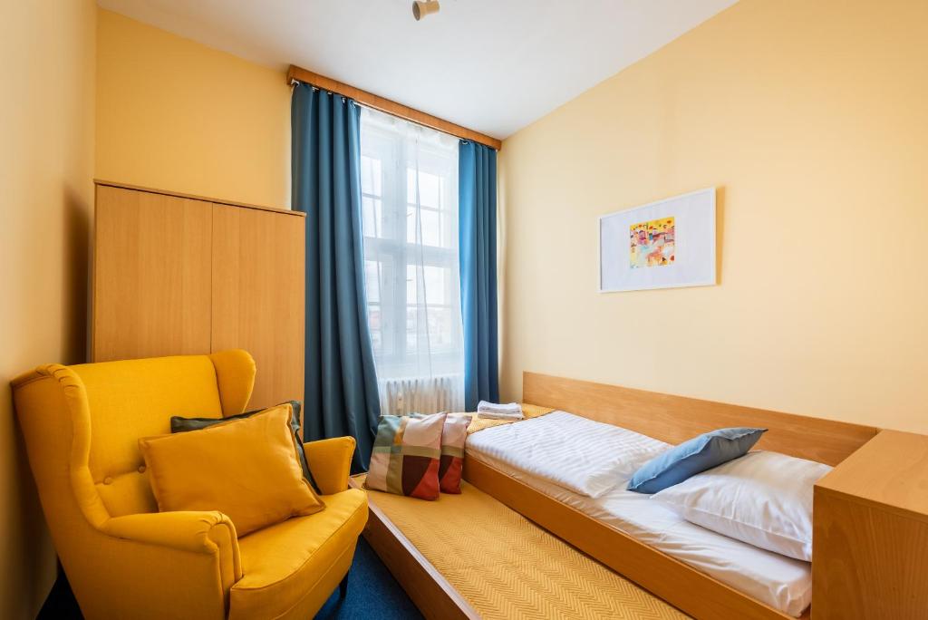 Postel nebo postele na pokoji v ubytování Libero Residence