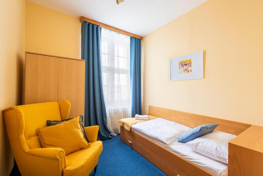 Postel nebo postele na pokoji v ubytování Libero Residence