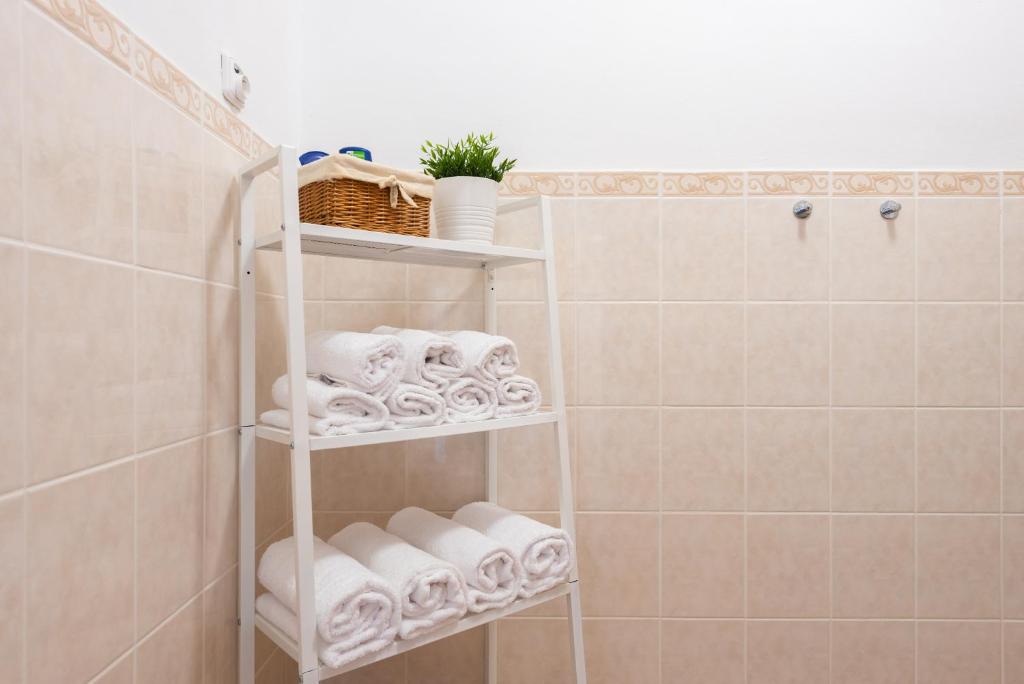 Koupelna v ubytování Libero Residence