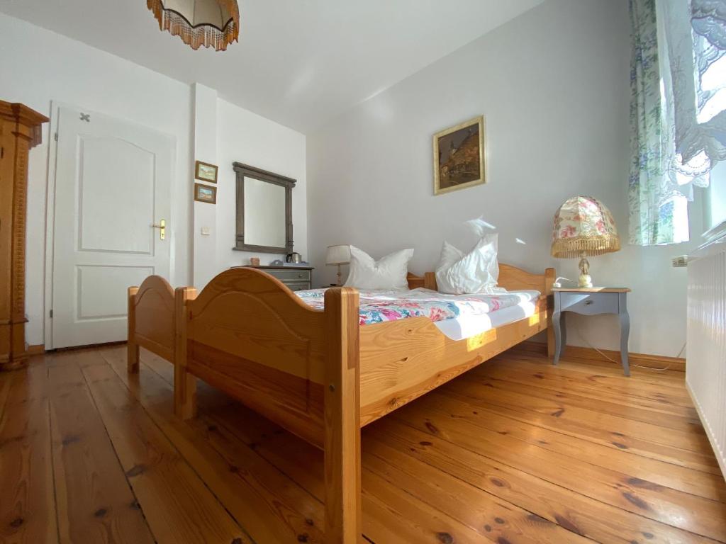 Posteľ alebo postele v izbe v ubytovaní Villa Parkowa 5