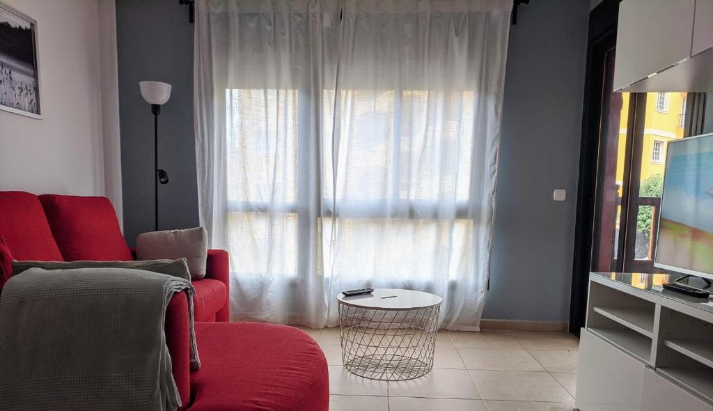 Posedenie v ubytovaní Espacioso apartamento de 2 dormitorios