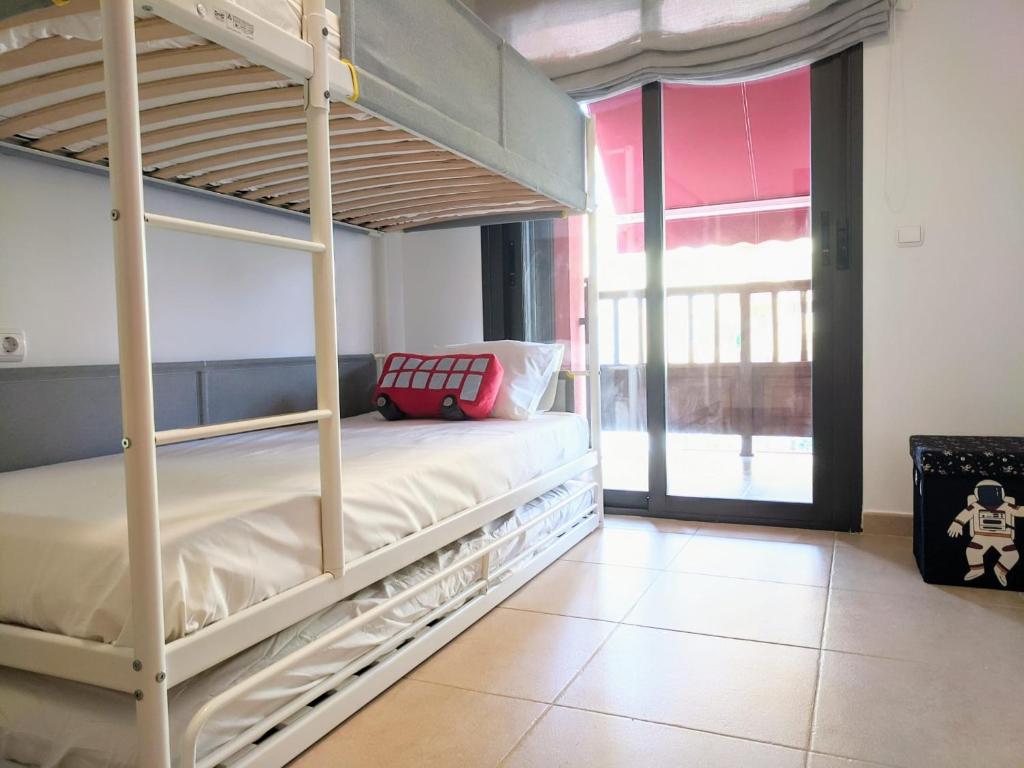 Posteľ alebo postele v izbe v ubytovaní Espacioso apartamento de 2 dormitorios
