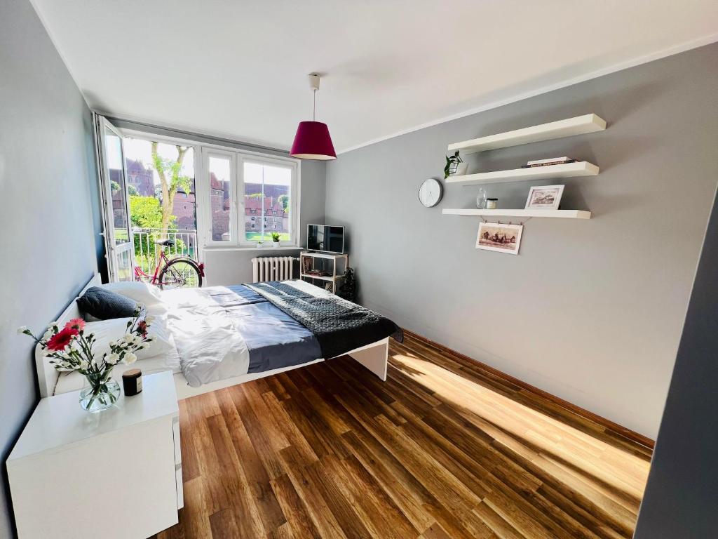 Posteľ alebo postele v izbe v ubytovaní Castle View Apartment