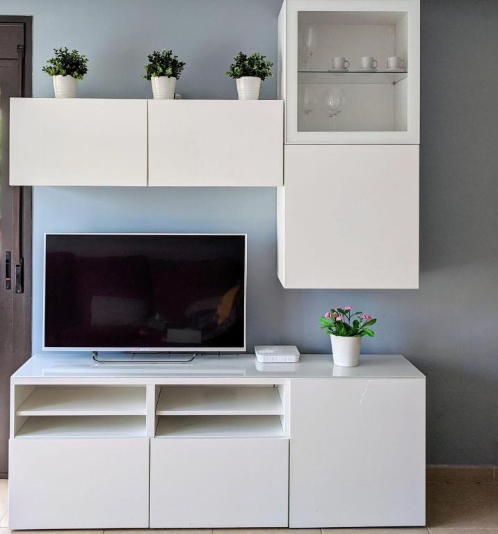 Televízia a/alebo spoločenská miestnosť v ubytovaní Espacioso apartamento de 2 dormitorios