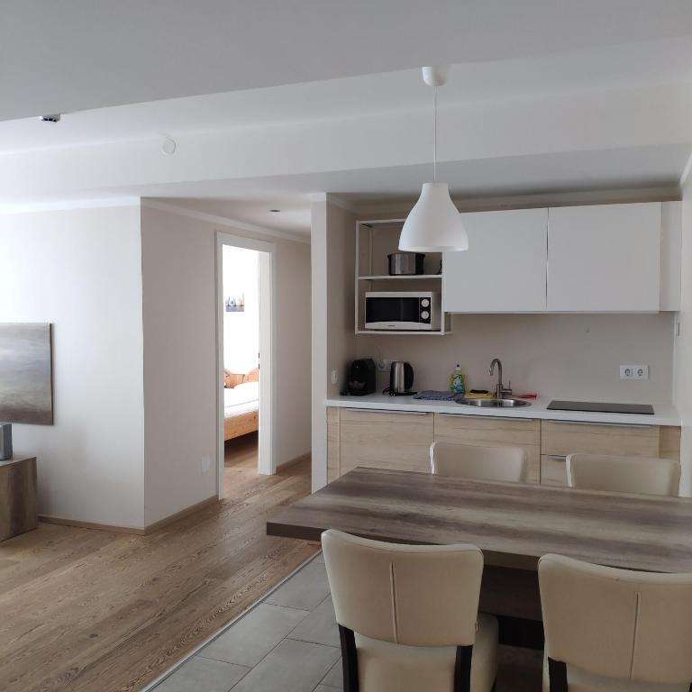 Kuchyň nebo kuchyňský kout v ubytování Hotel Lindenhof
