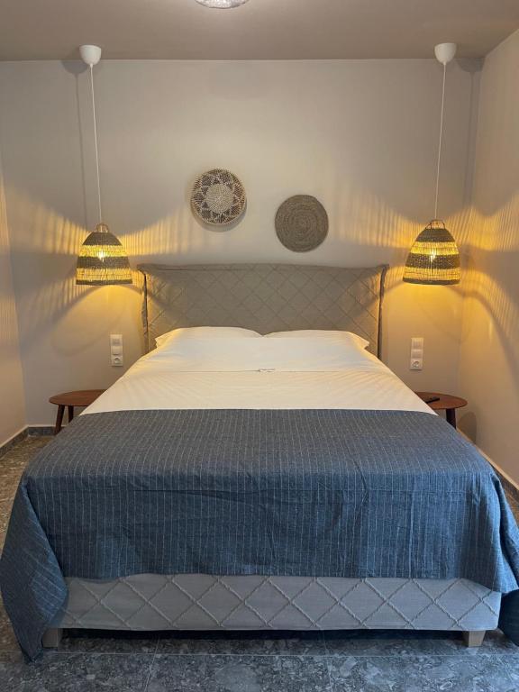 Postel nebo postele na pokoji v ubytování Istoria Boutique Hotel