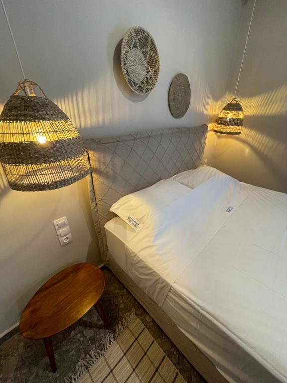 Postel nebo postele na pokoji v ubytování Istoria Boutique Hotel