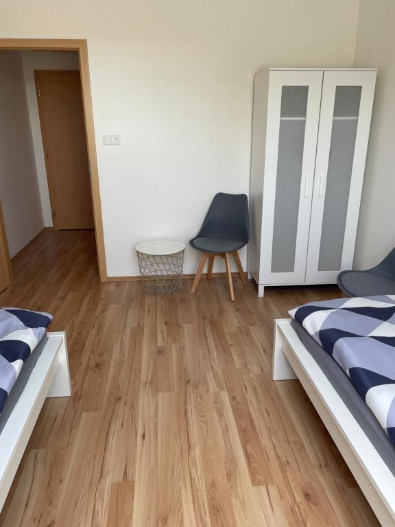 Postel nebo postele na pokoji v ubytování Adama PRO