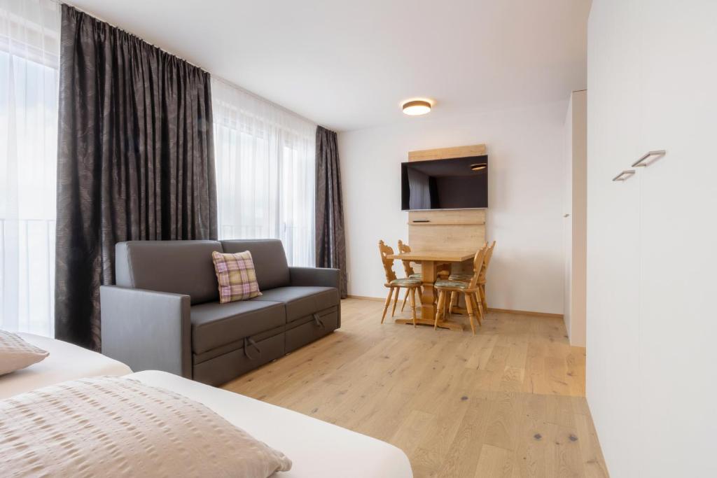 TV a/nebo společenská místnost v ubytování Hotel Tannenboden