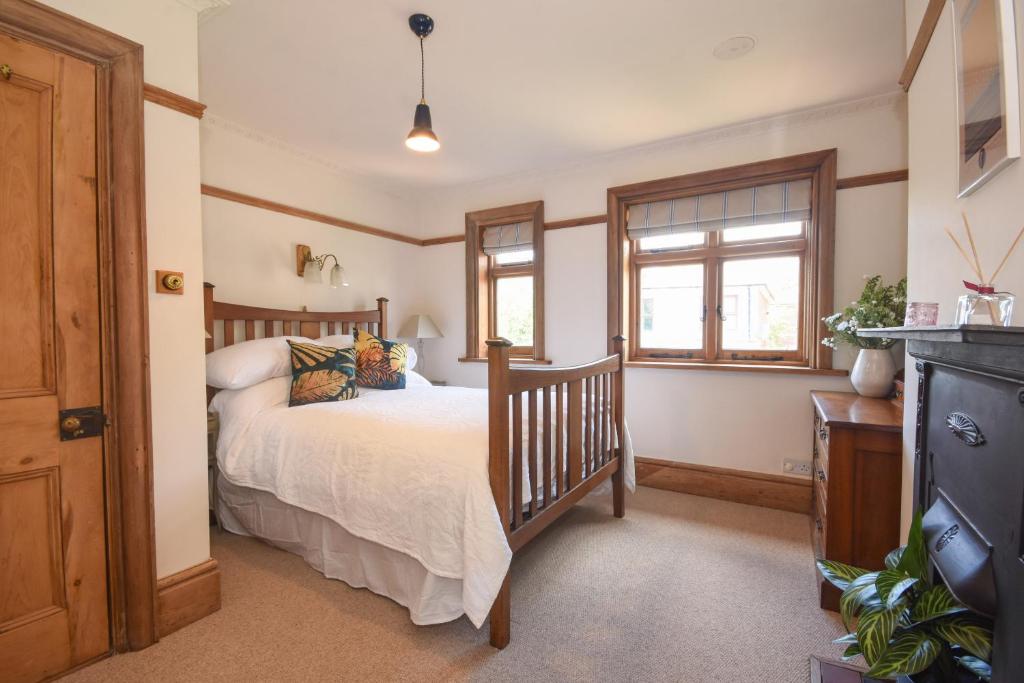 Ένα ή περισσότερα κρεβάτια σε δωμάτιο στο Unique period one bedroom house in Colchester