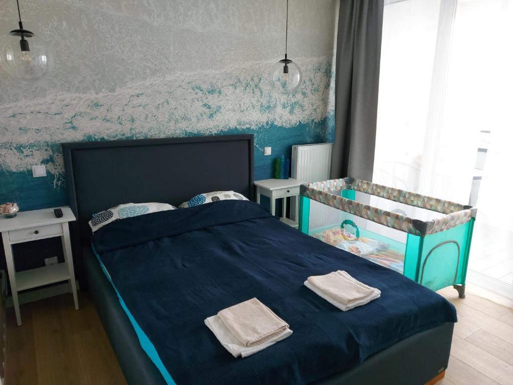 Posteľ alebo postele v izbe v ubytovaní Baltic Blue Apartament