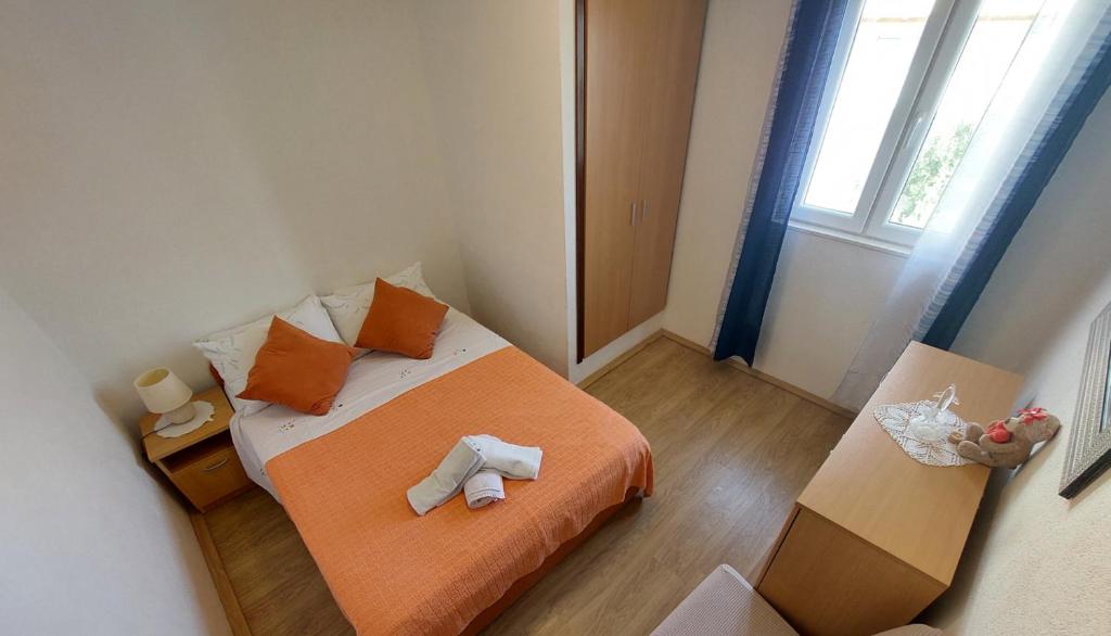 Postel nebo postele na pokoji v ubytování Seaview apartment Primošten