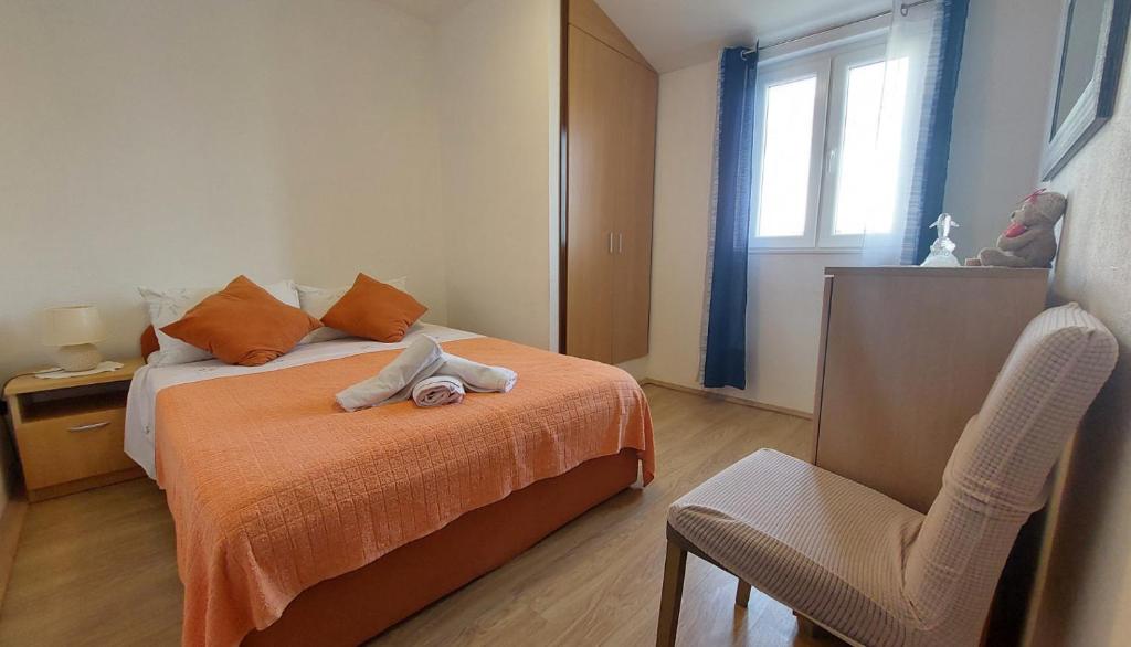 Postel nebo postele na pokoji v ubytování Seaview apartment Primošten
