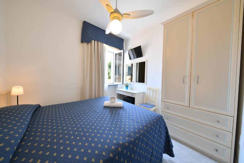 Postel nebo postele na pokoji v ubytování Hotel Noris