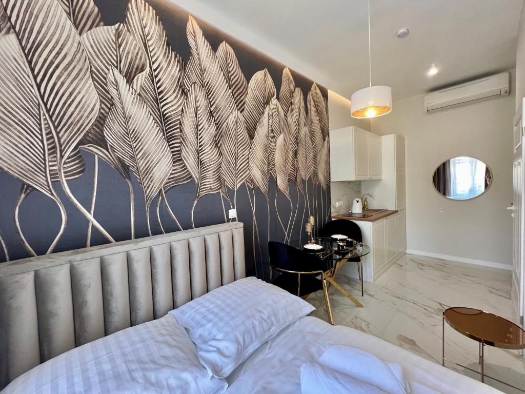 Posteľ alebo postele v izbe v ubytovaní Art Apartments Warszawska 21 Katowice