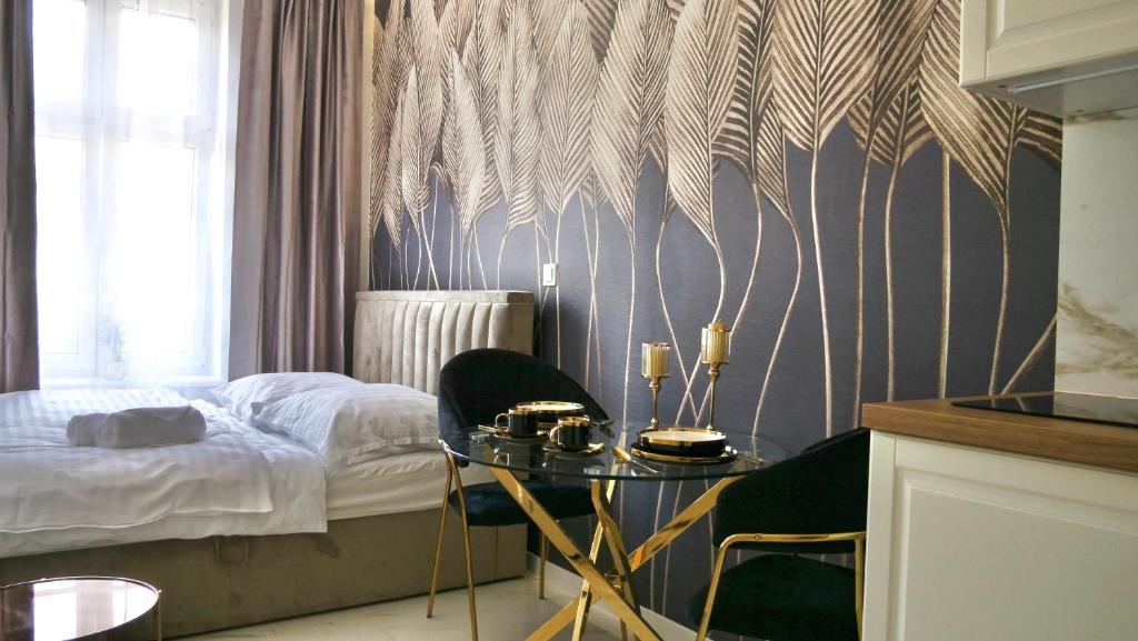 Posteľ alebo postele v izbe v ubytovaní Art Apartments Warszawska 21 Katowice