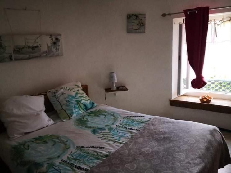Postel nebo postele na pokoji v ubytování Hotel Ô Fil de L'ô