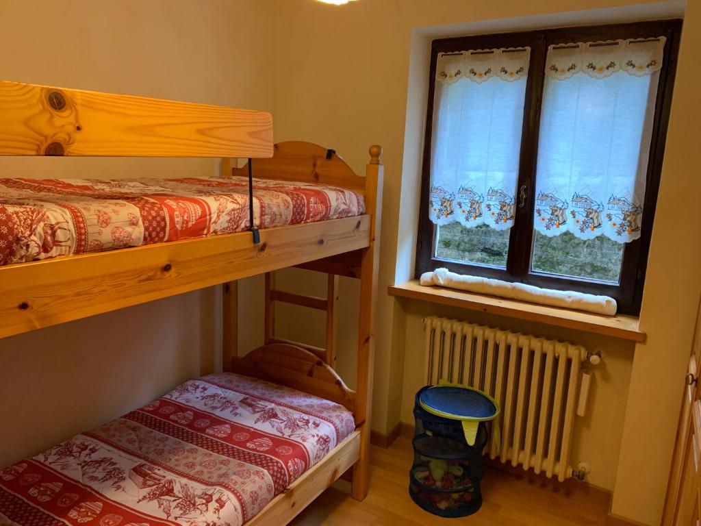 Postel nebo postele na pokoji v ubytování Bielmonte Appartamenti