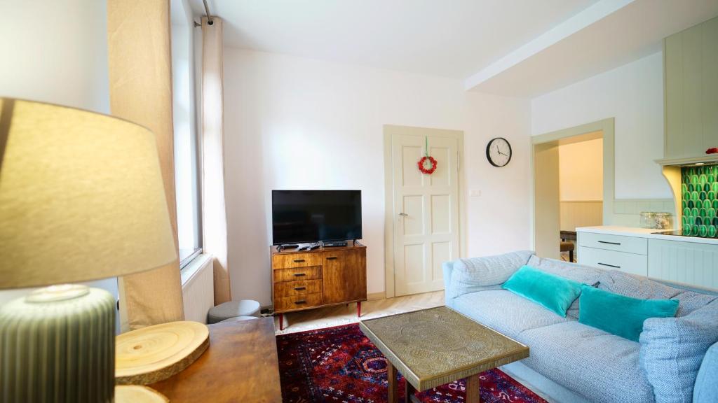 Televízia a/alebo spoločenská miestnosť v ubytovaní Apartamenty EverySky Szklarska Poręba - 1 go Maja 13