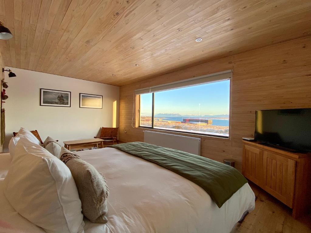 Postel nebo postele na pokoji v ubytování Line Hotel Patagonia