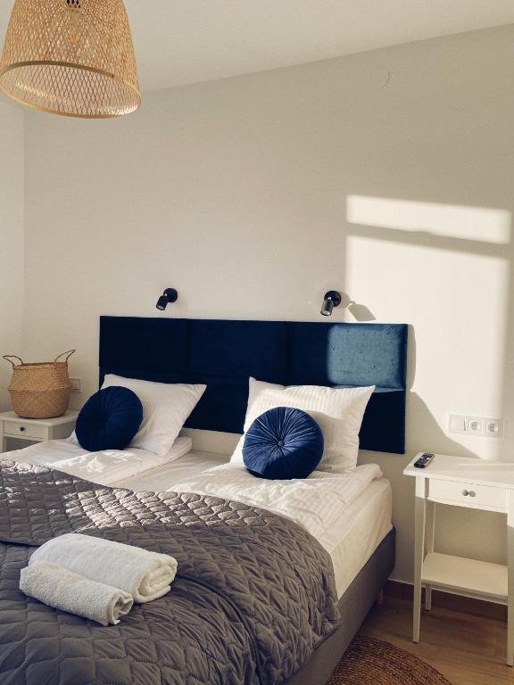 Letto o letti in una camera di Ostrovia - pokoje nad morzem
