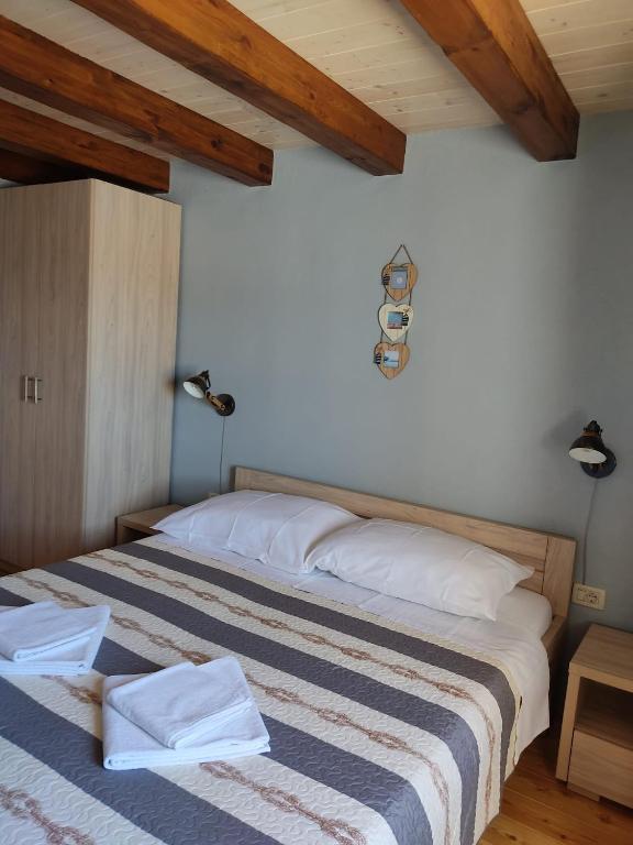 Postel nebo postele na pokoji v ubytování House Tuna