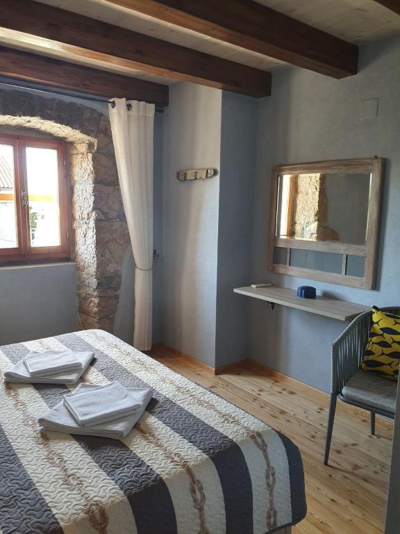 Postel nebo postele na pokoji v ubytování House Tuna