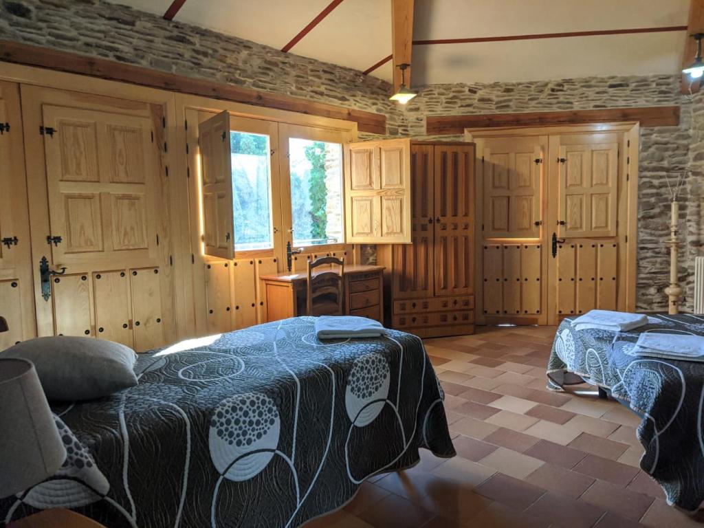 Postel nebo postele na pokoji v ubytování Casa rural El Arroyo
