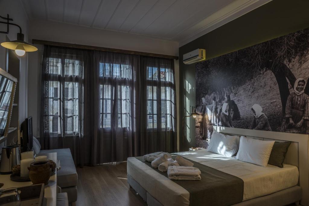 Un pat sau paturi într-o cameră la Elia Daliani