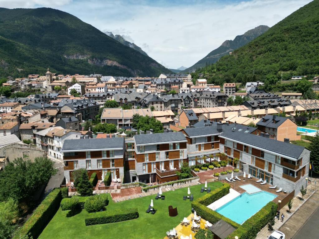 an aerial view of a town with a resort at Tierra de Biescas in Biescas