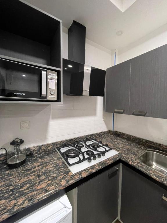 Kuchyň nebo kuchyňský kout v ubytování CasaHouse Apparts