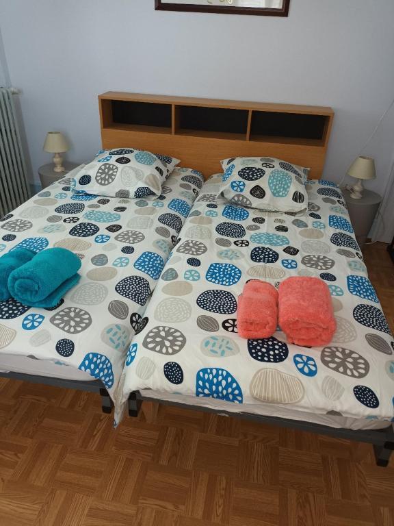 Postel nebo postele na pokoji v ubytování Gîte Le Noisetier