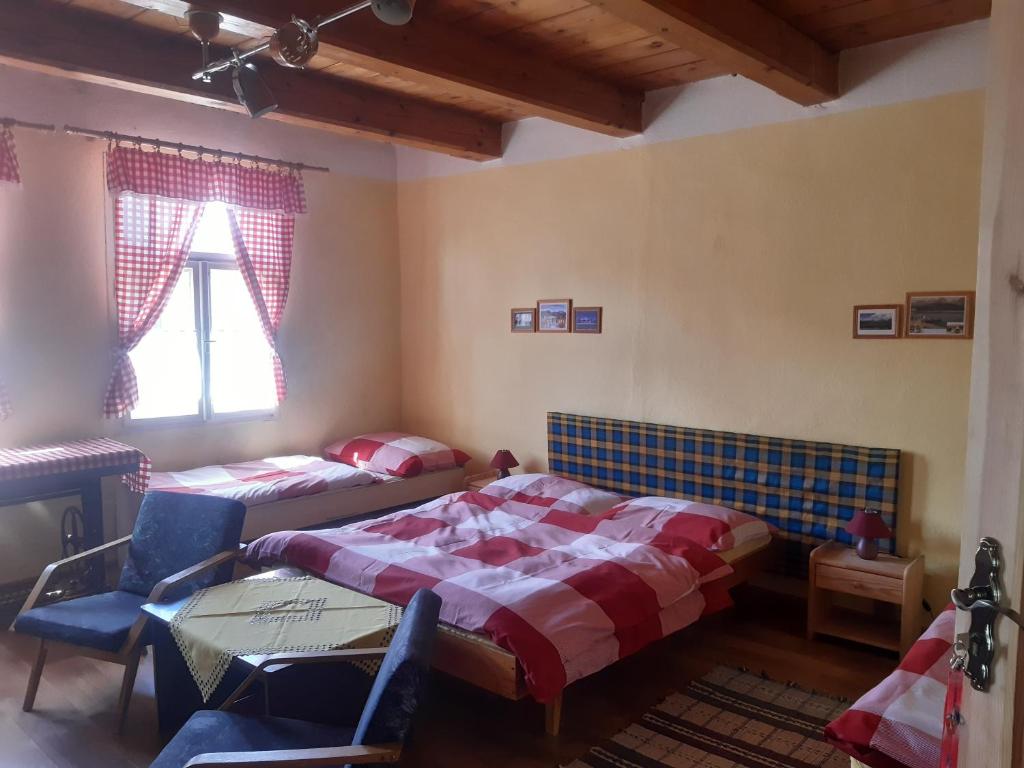 Postel nebo postele na pokoji v ubytování Apartment Romanticka Chalupa