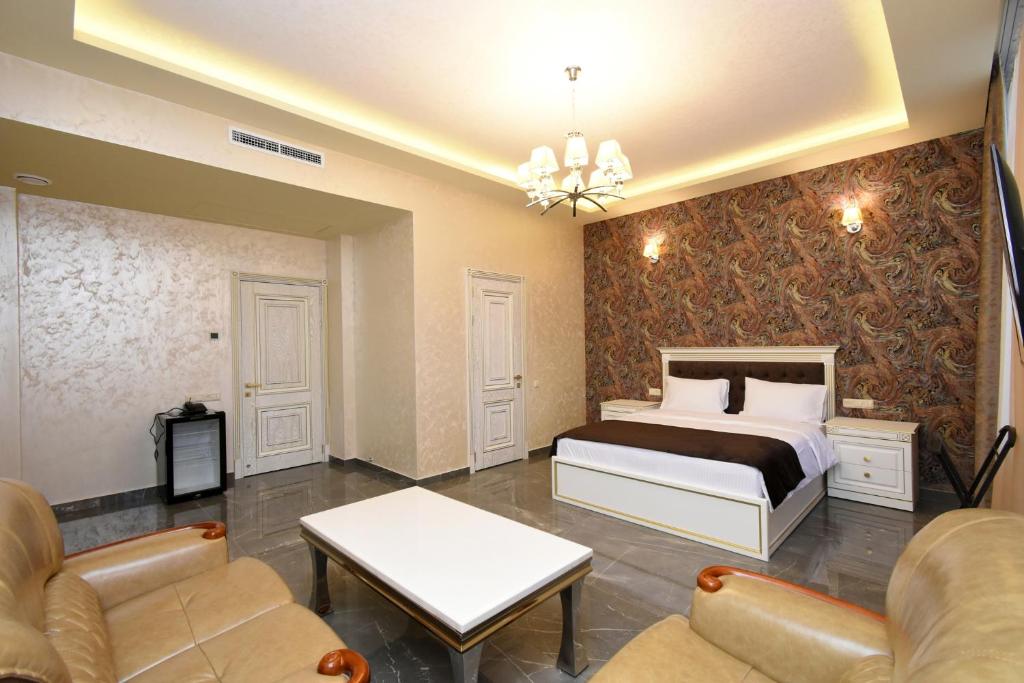 Postel nebo postele na pokoji v ubytování Macao Hotel