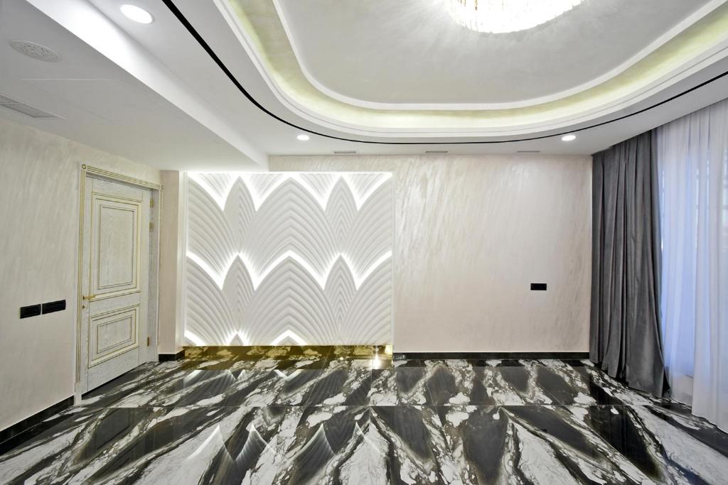 Postel nebo postele na pokoji v ubytování Macao Hotel