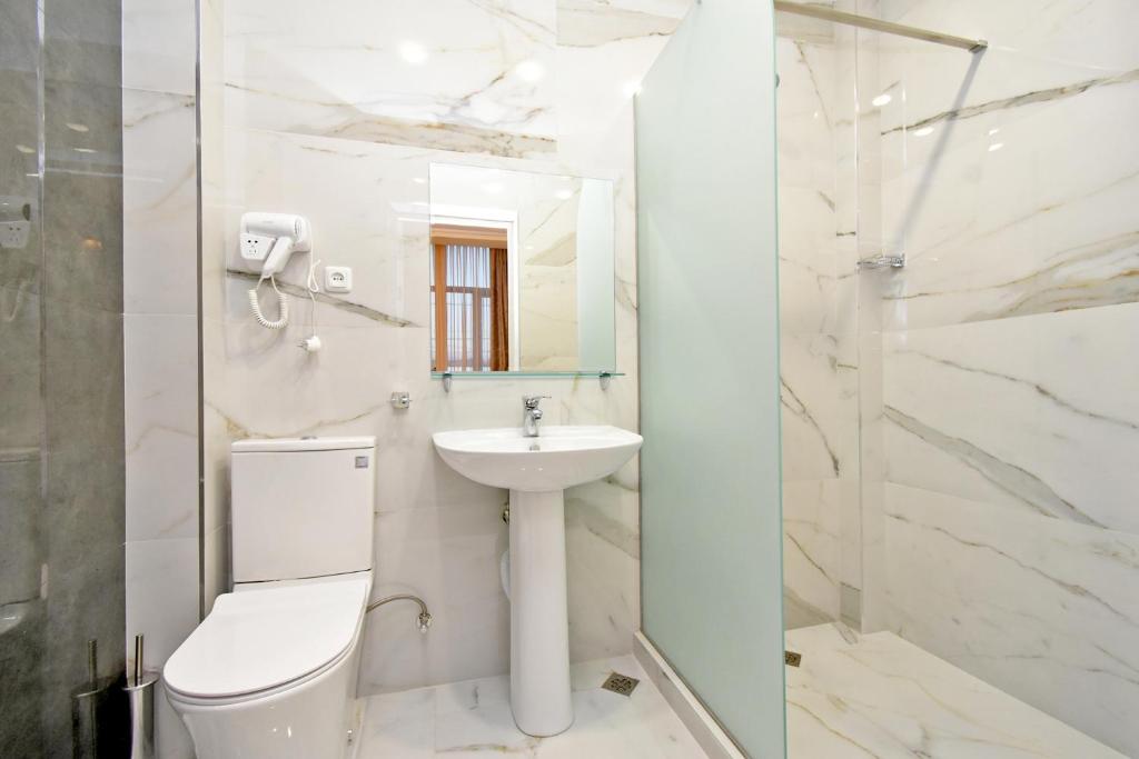 Koupelna v ubytování Macao Hotel