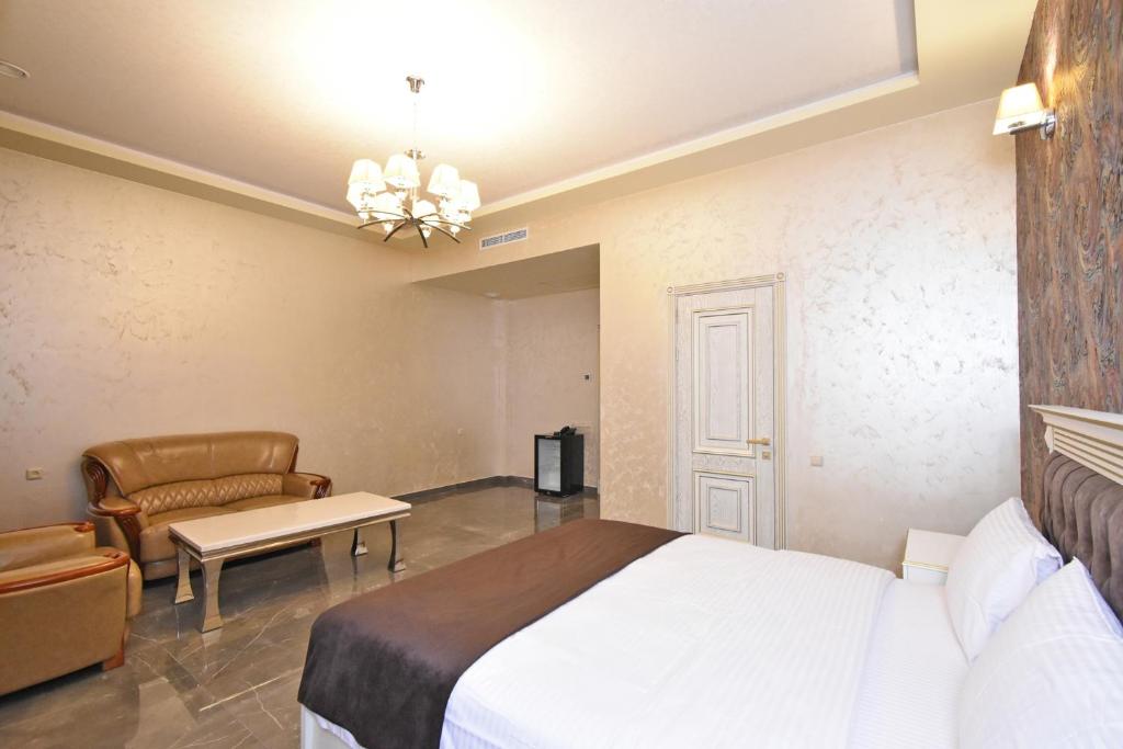 Postel nebo postele na pokoji v ubytování Macao Hotel