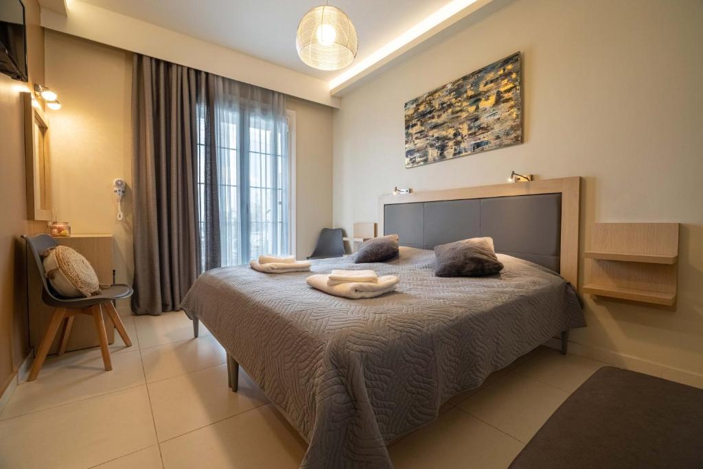 Postel nebo postele na pokoji v ubytování ANGELO Cafe Hotel