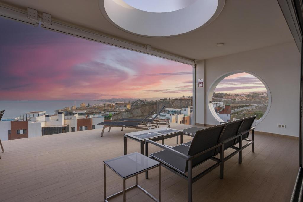 A balcony or terrace at Ensuite Penthouse Panoramic Sea View with Jacuzzi