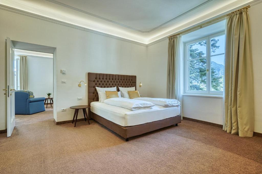 Postel nebo postele na pokoji v ubytování Villa Tell rooms and suites