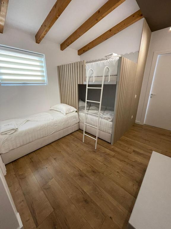 Postel nebo postele na pokoji v ubytování Hotel PortSide GF