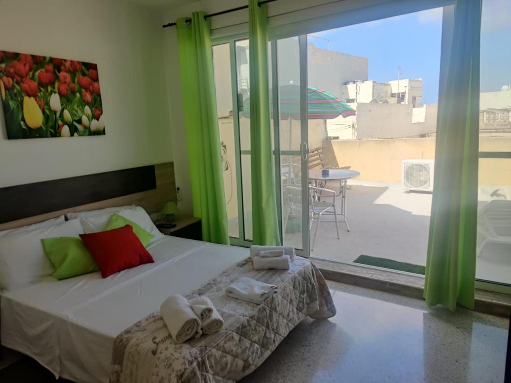 Postel nebo postele na pokoji v ubytování D'Ambrogio Guest House