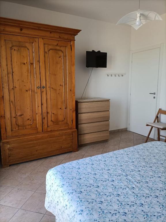 A bed or beds in a room at Il Respiro del Mare