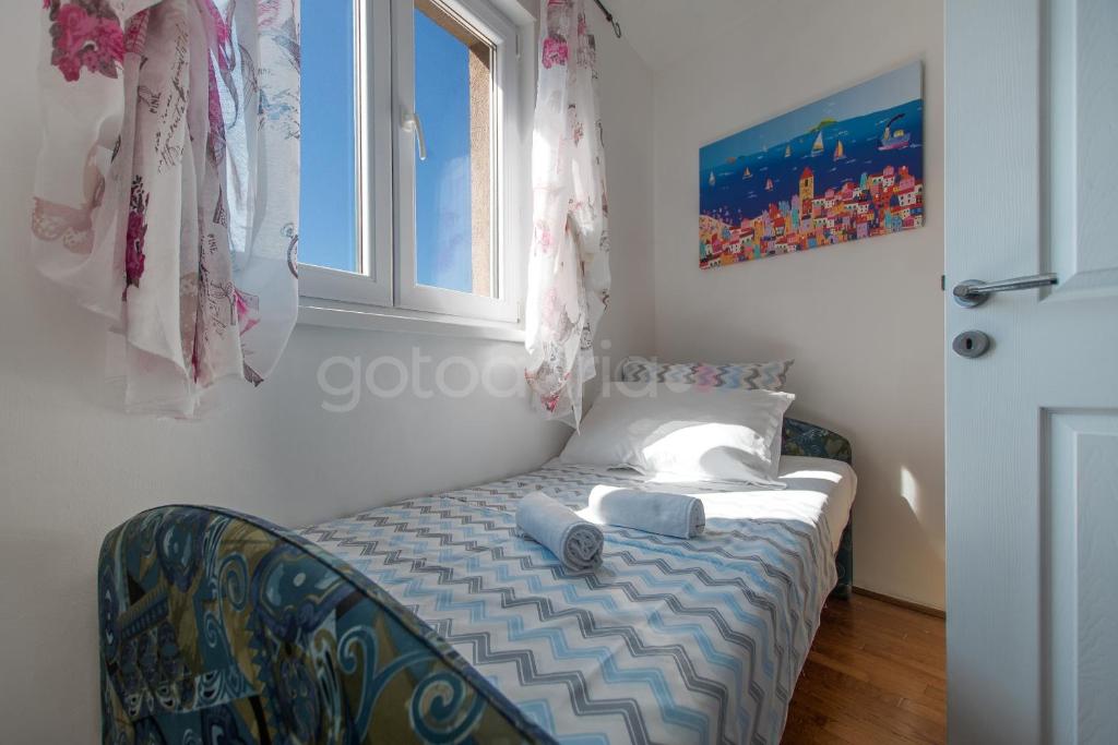 Posteľ alebo postele v izbe v ubytovaní Seaview apartments Duky